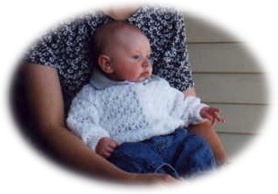 Nathan in Mom's lap.